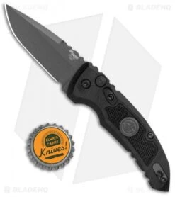 Hogue Knives A01 Microswitch Auto Knife Sig Medallion Drop Point (2.6" Black) -Sharp Blade Depot Hogue A01 Microswitch Wharncliffe Black Sig Medallion Black 16112 BHQ 100451 jr bottlecap